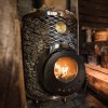 Дровяная печь Original IKI со стеклянной дверцей в интерьере