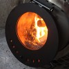 Дровяная печь Original IKI со стеклянной дверцей в интерьере